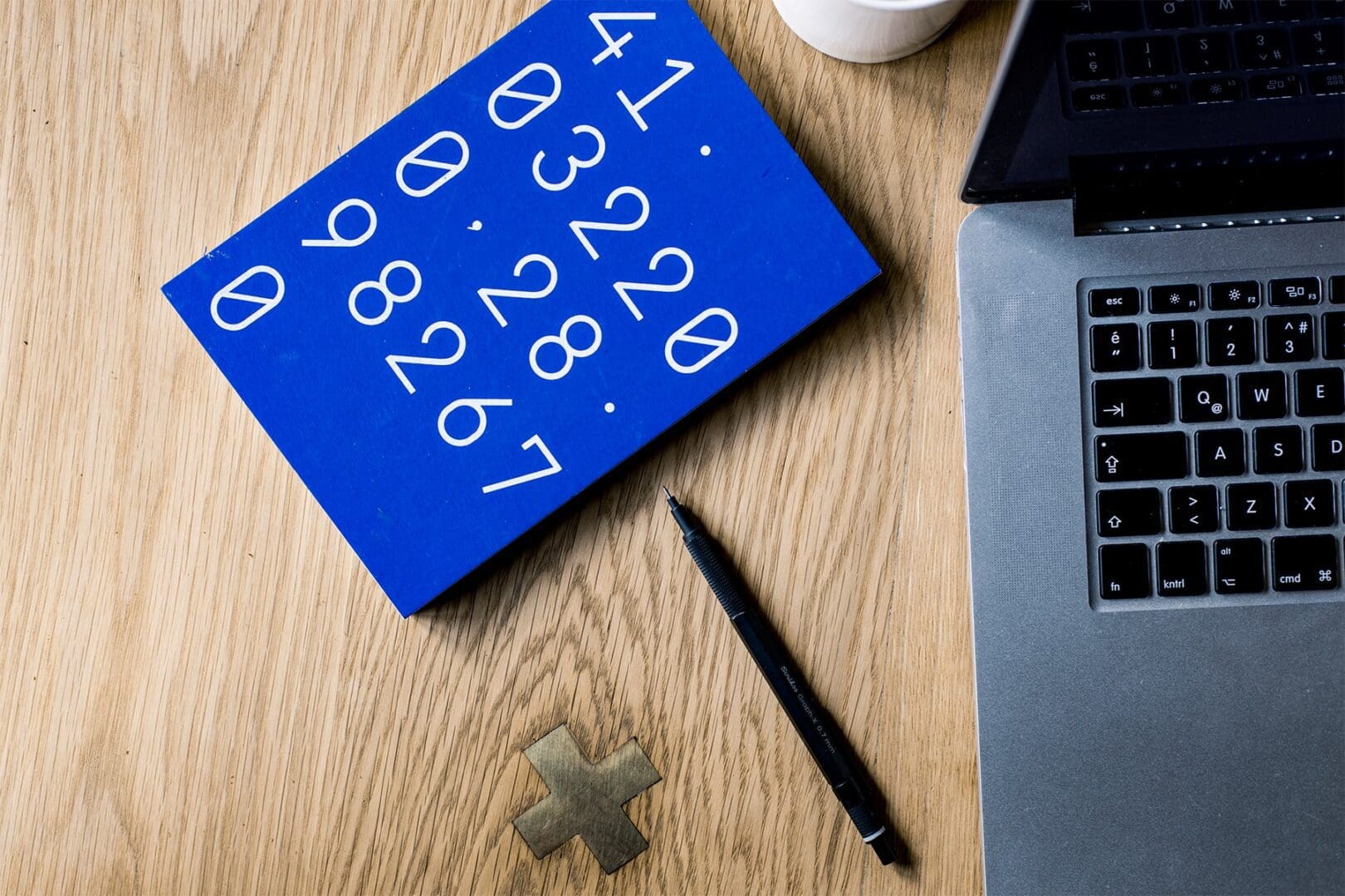 irs form 8082 - laptop and blue pad with numbers